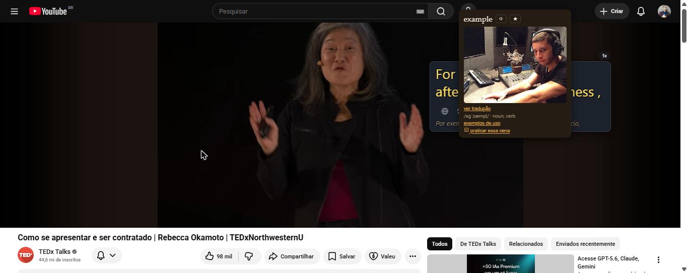 Print real da extensão aberta sobre um vídeo do YouTube, com o popup da palavra "example" mostrando imagem, pronúncia e tradução